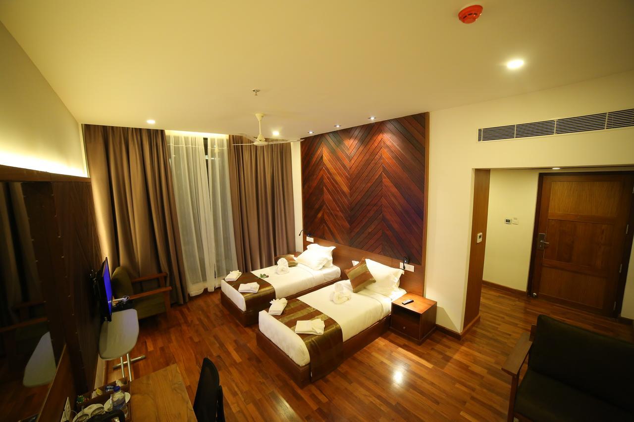 Woodies Bleisure Hotel Kozhikode Dış mekan fotoğraf